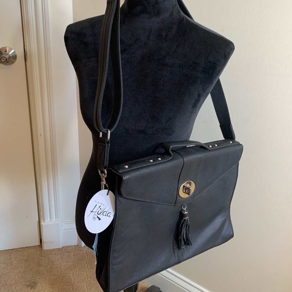Gun tote’n Momma Chic Black Crossbody Bag with Tassel. Concealed compartment